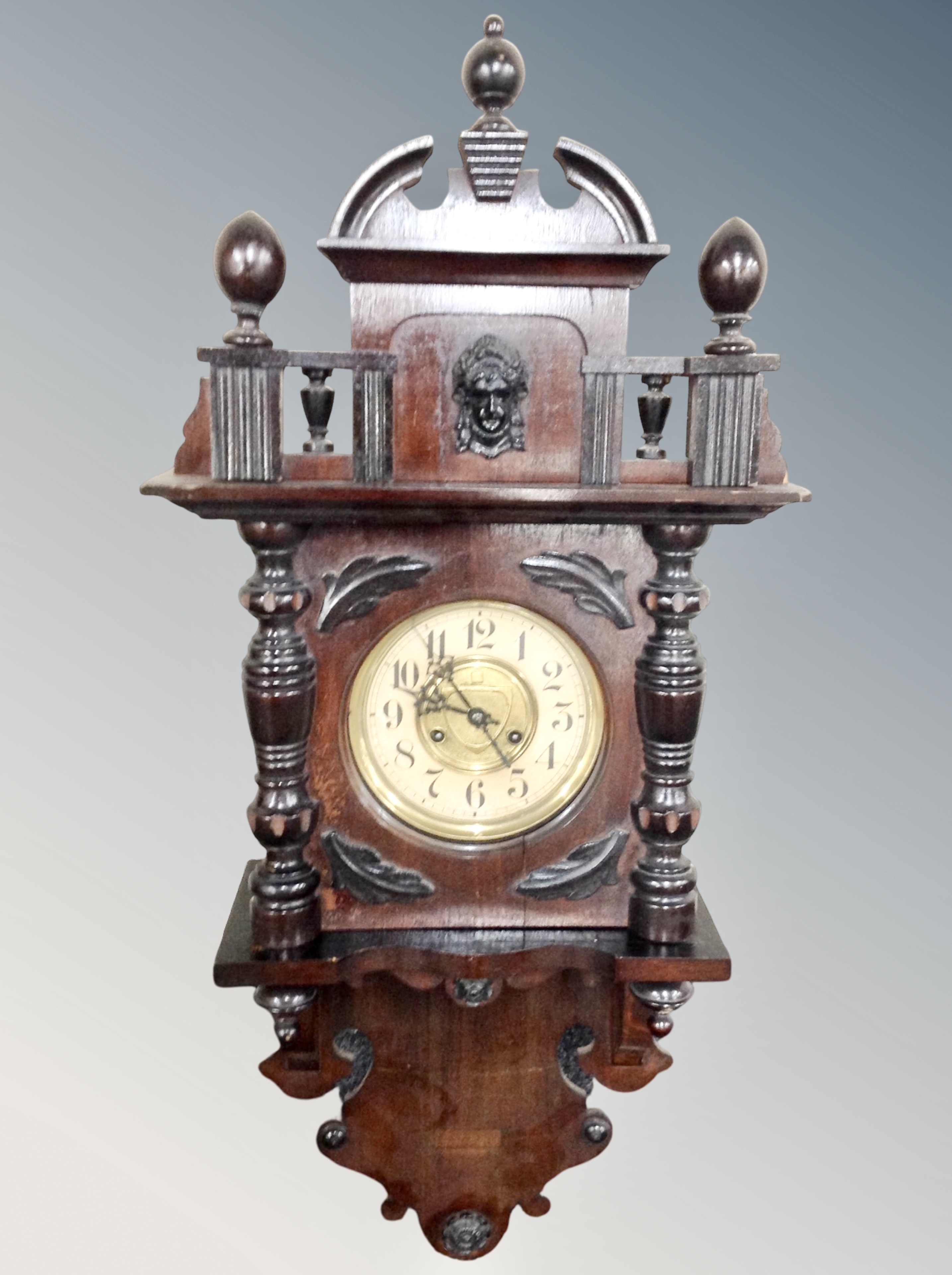 A continental mahogany cased 8 day wall clock.