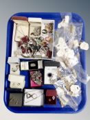 A tray of costume jewellery, dress rings, boxed earrings,