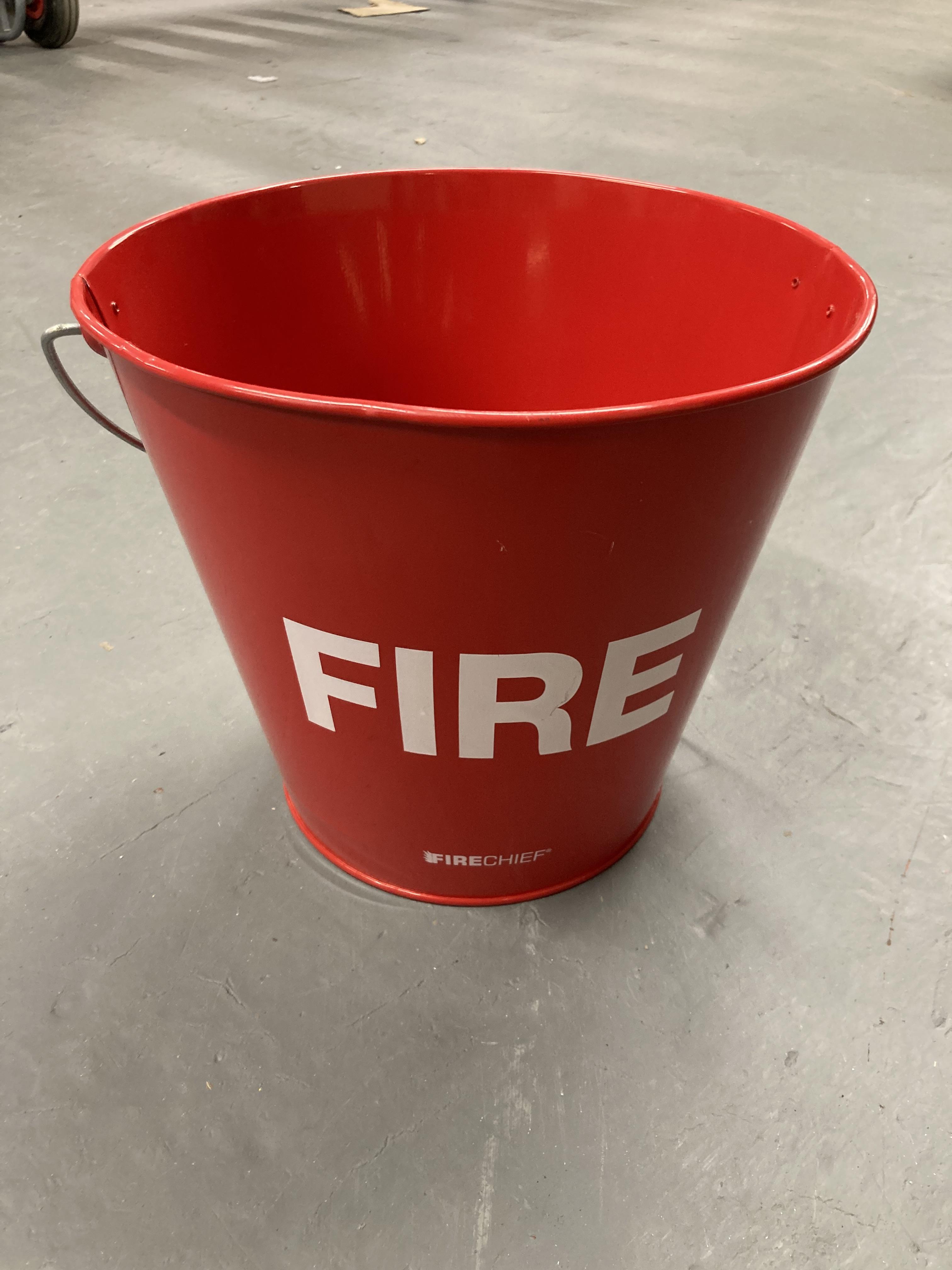 A red metal fire bucket