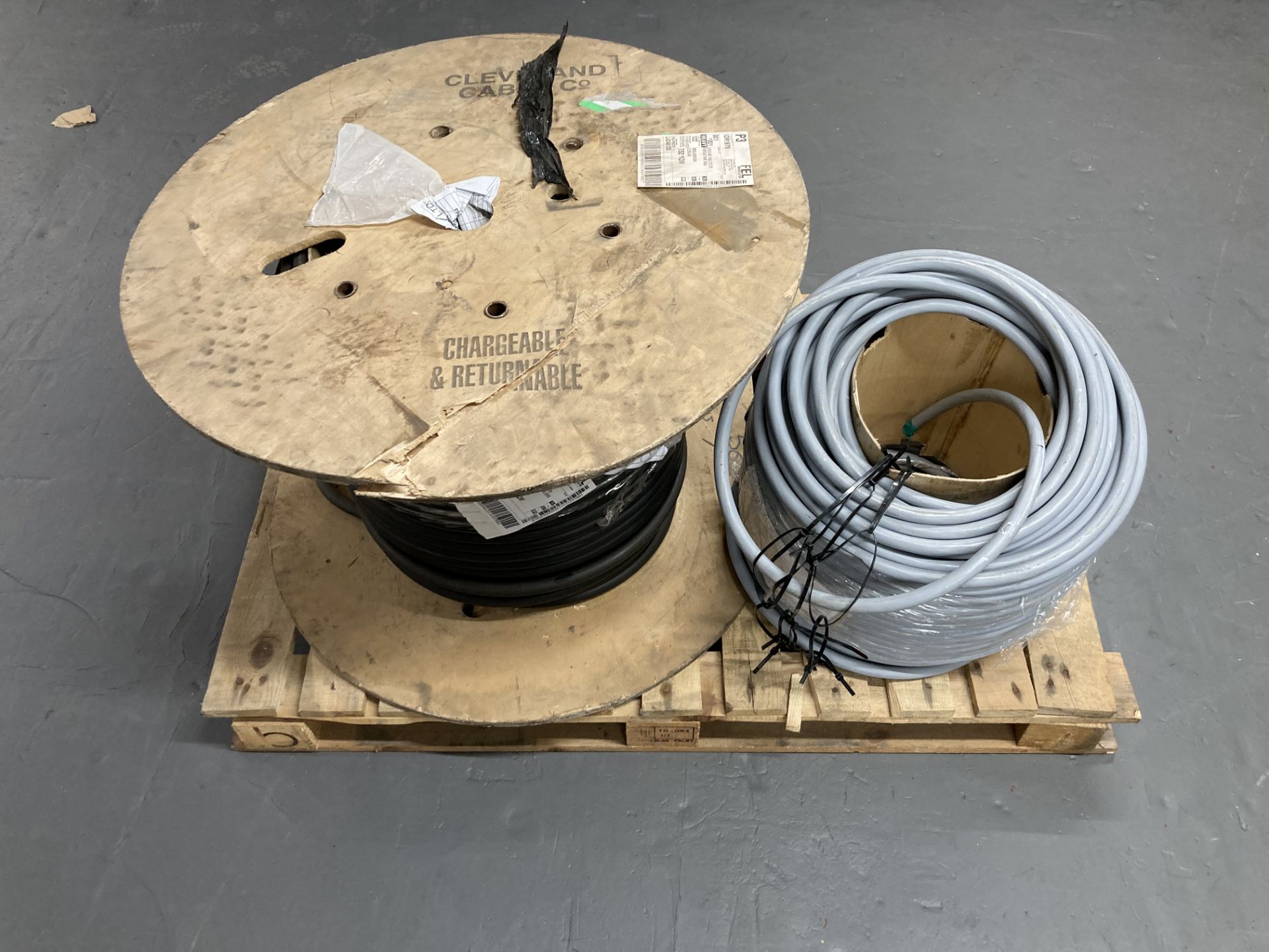 Two spools of armoured cable