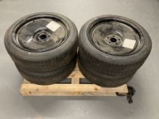 Four tyres on metal rims,