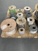 Eleven spools of various electrical cable