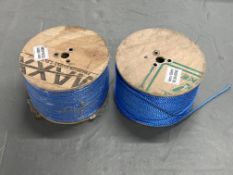 Two large spools of blue rope.