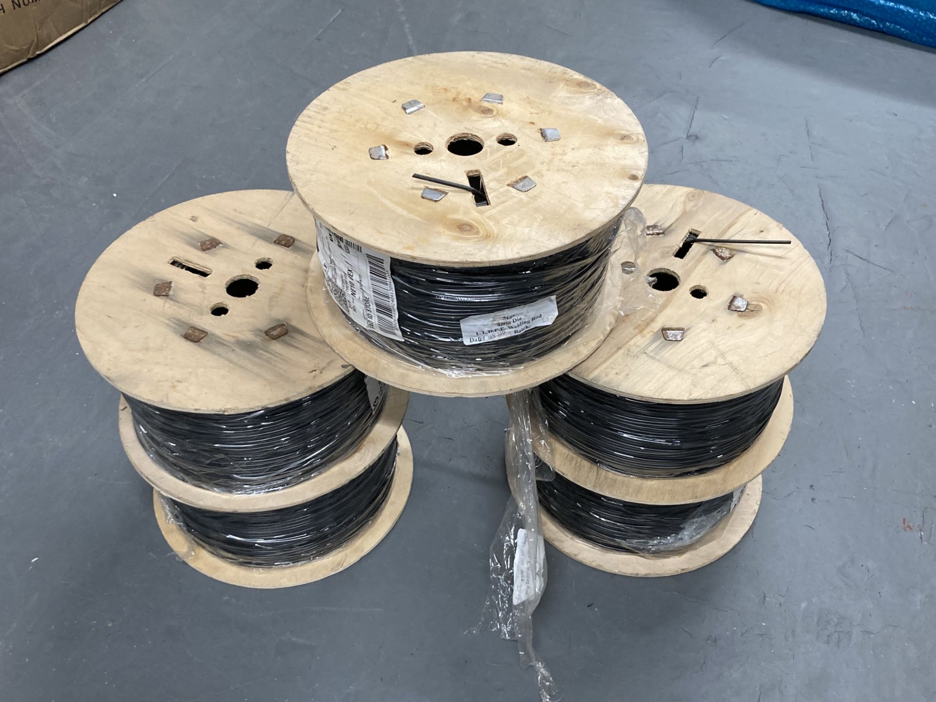 Five spools of welding cable.