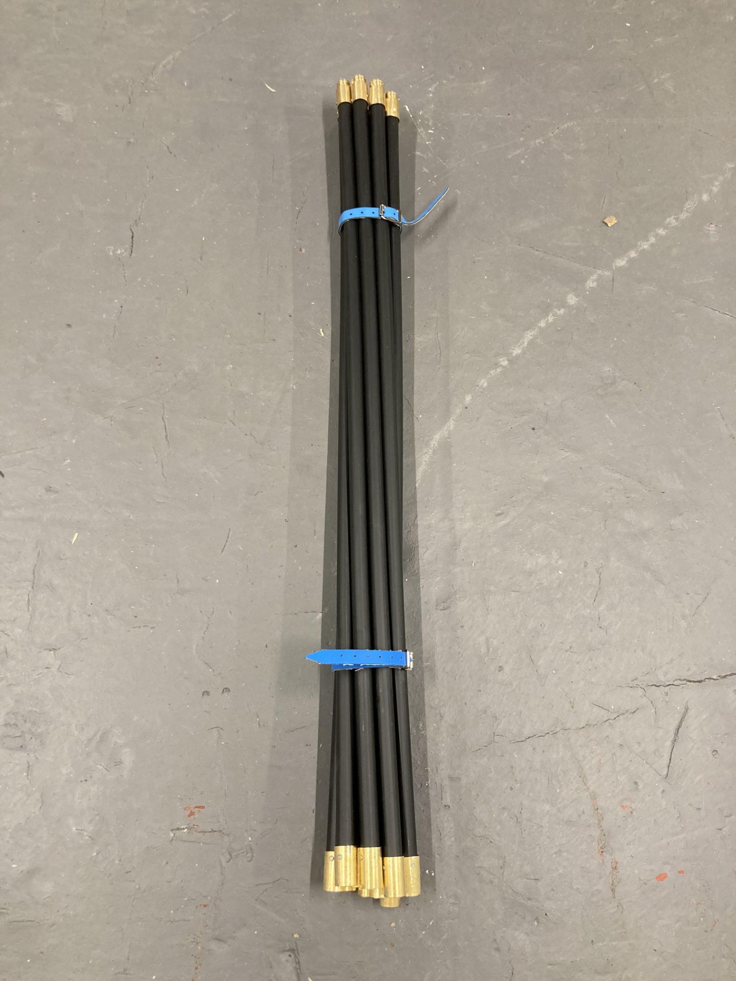 A bundle of drain rods.