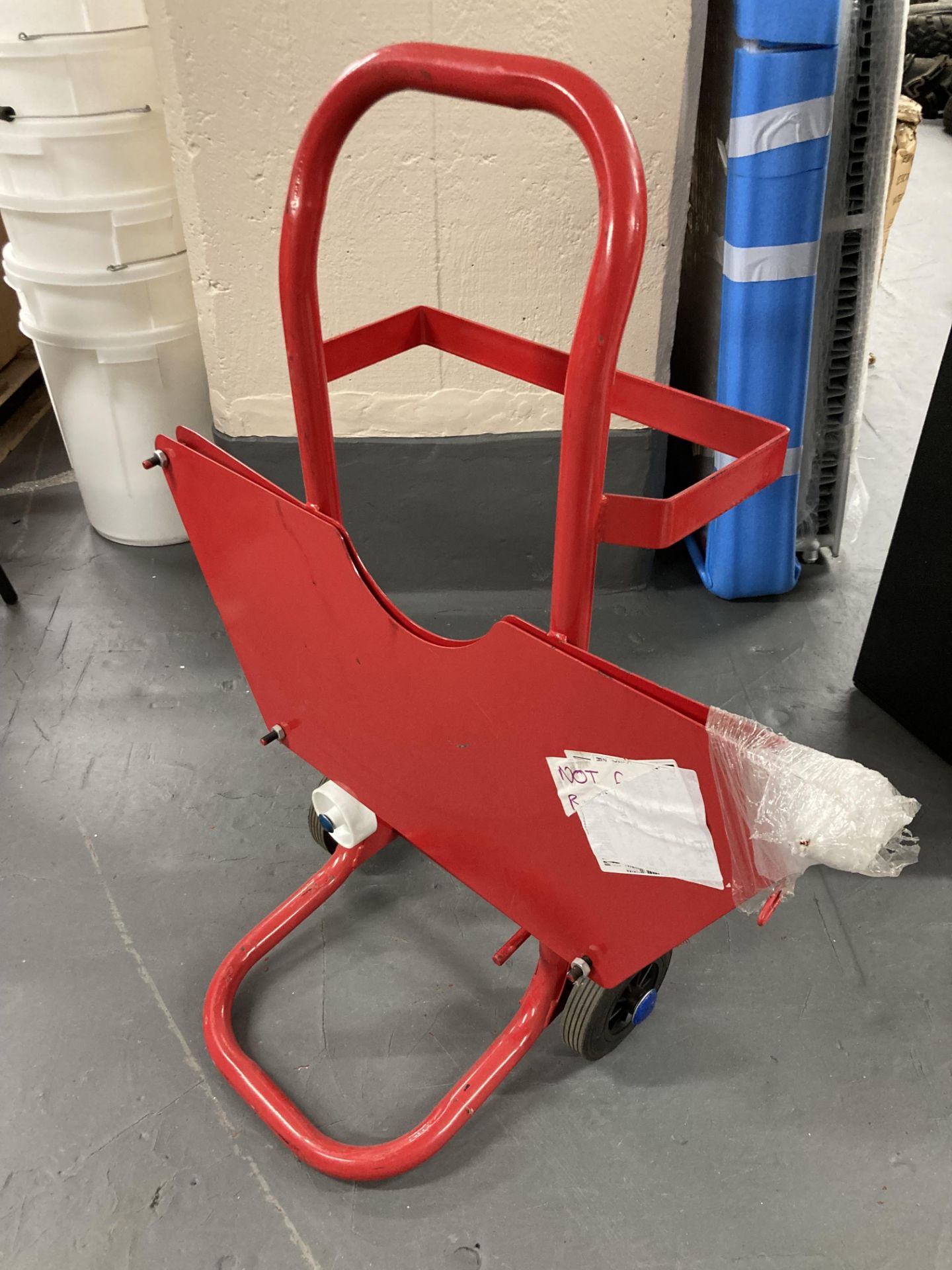 A red metal multi use sack barrow / trolley