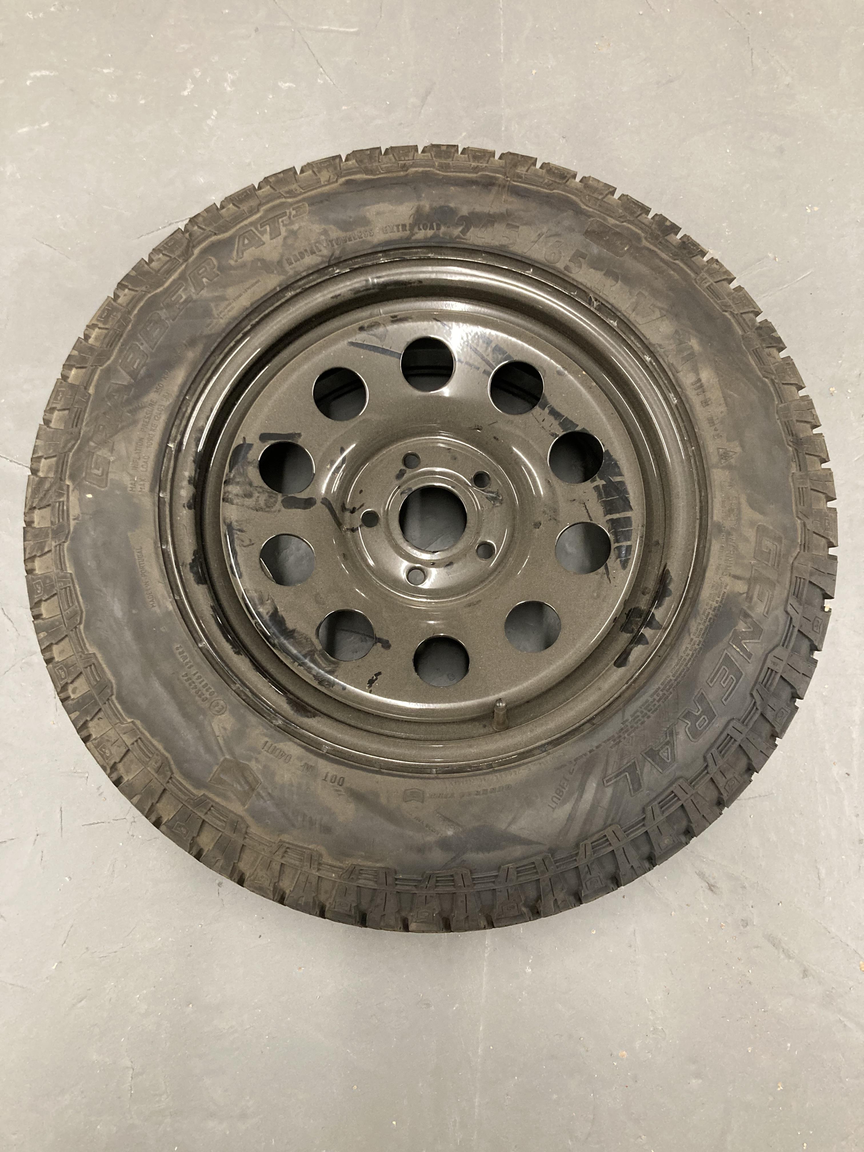 A un-used wheel on metal rim with General Grabber AT3 245/65.R17XL tyre.