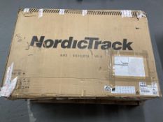 A Nordic track commercial S22I studio cycle in box.