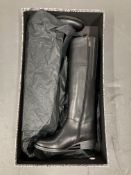 A pair of Duo boots : Midnishy boots, black, EU size 35,
