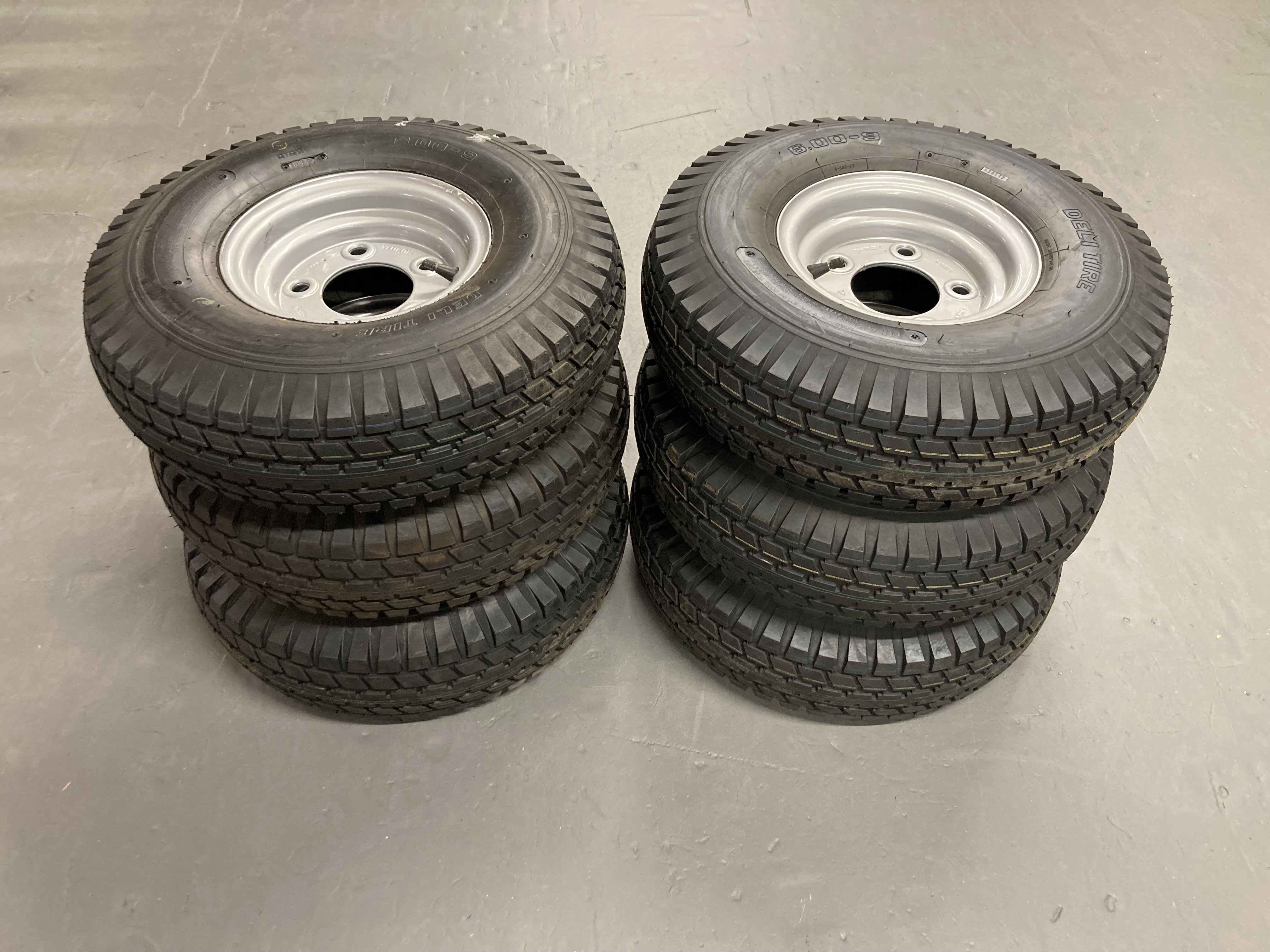 Six wheels on metal rims with Deli Tire, 6.