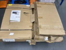 A pallet of flat pack items to include a reclining sun lounging chair, wooden table top,