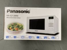 A Panasonic NN-E27JWM microwave oven (white).