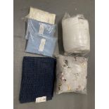 A duvet (size unknown) together with a navy bath mat,