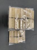 Ten packs of ten wooden nail brushes.