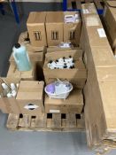 A pallet of stock items - boxed garden parasols, hand creams, floor cleaner,