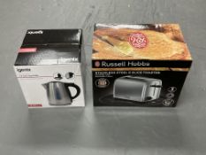 A Russell Hobbs toaster together with a Igenix stainless steel jug kettle.