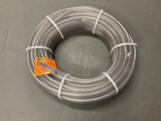 A large length of Continental Merlett Armorvin HNP pvc hose with galvanised steel spiral