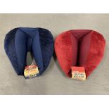 Sixteen Globe Trek International sculptured neck pillows,