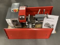 A MX-180V-210V variable speed lathe, MX-180D partly in crate.