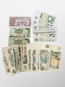 A collection of fifty one British Banknotes : £1 British Armed Forces note,
