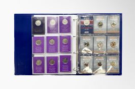 A collection of sixteen Guernsey 2022 50p coins - The Queen's Platinum Jubilee,