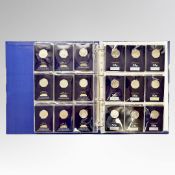 A Change Checker coin album containing forty five collectable 50 pence coins,