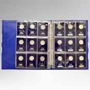 A Change Checker coin album containing fifty four collectable 50 pence coins,