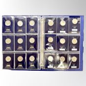 A Change Checker coin album containing thirty six collectable £2 coins, various dates and themes.