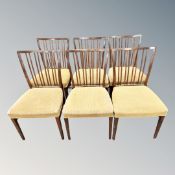 A set of six Continental beech rail backed dining chairs in olive upholstery