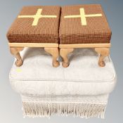 A contemporary square footstool in tasseled cream upholstery together with further pair of church