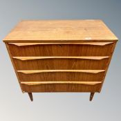 A 20th century Scandinavian oak three drawer chest,