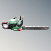 A Qualcast petrol chain saw