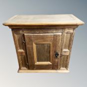 A Continental oak single door wall cabinet ,