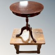 An oak refectory coffee table together with further tripod table