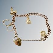 A 9ct gold charm bracelet