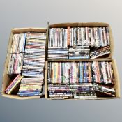Three boxes of approximately 150 DVD's