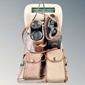 A vintage Kolster-Branders bakelite cased radio, Brownie box camera, pair of antique field glasses,