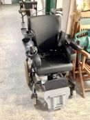 A Handicare electric wheel chair
