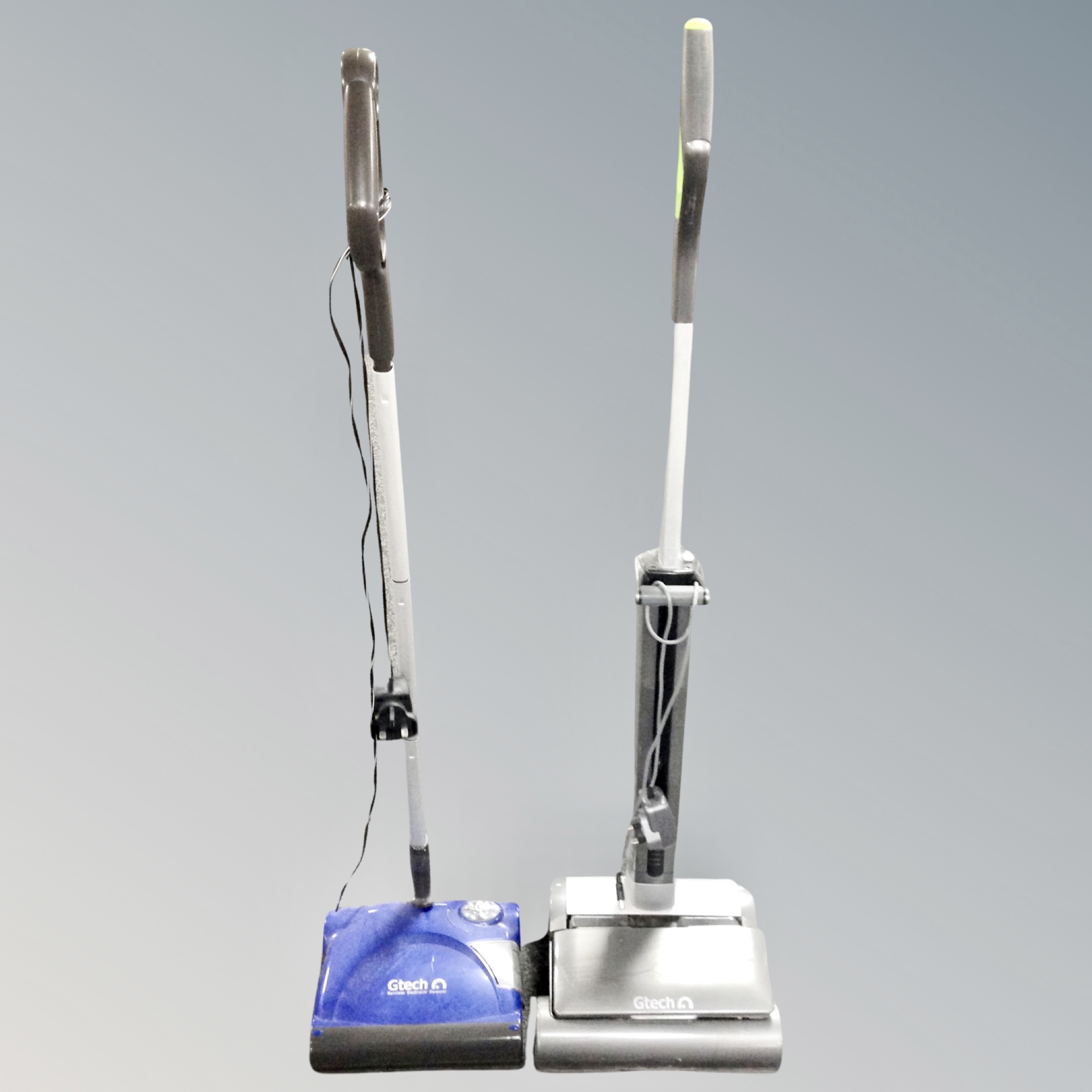 Two G-Tech vacuum cleaners