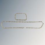 A silver chain and bracelet