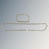 A silver chain and bracelet