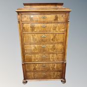 A 19th century mahogany seven drawer chest,