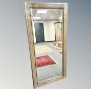 An ornate gilt rectangular mirror,