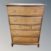 A Stag Minstrel seven drawer chest,