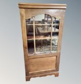 A Continental mahogany glazed bookcase,