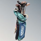 A golf bag containing assorted irons and driver, Donnay, Ping,