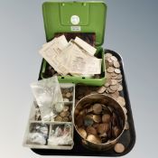 A tray of pre-decimal coins and bonds