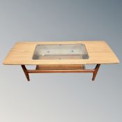 A shaped teak effect rectangular coffee table