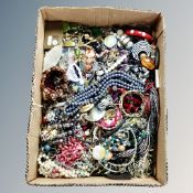 A large box of assorted costume jewellery