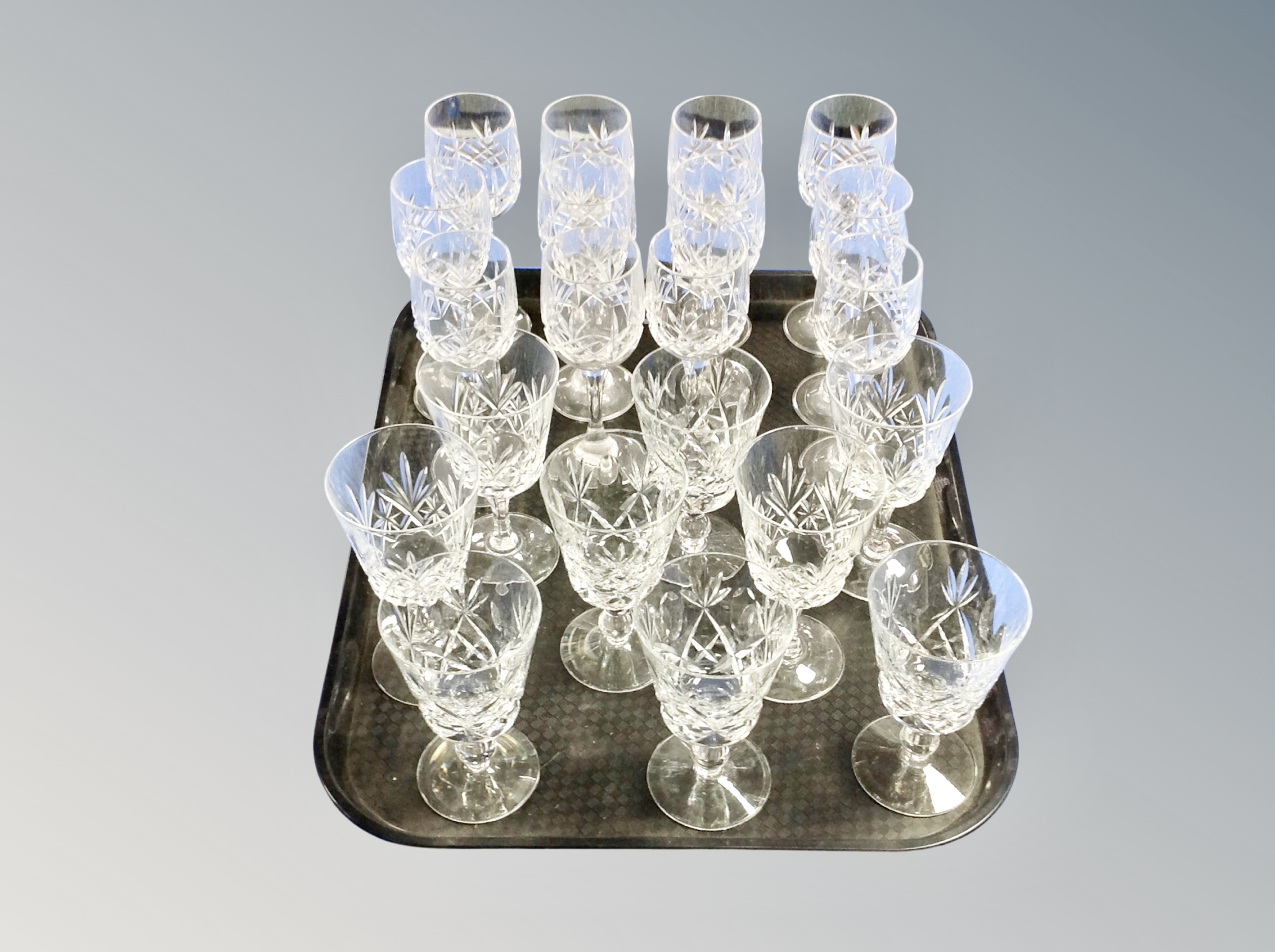 A tray of lead crystal drinking glasses